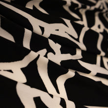 Load image into Gallery viewer, Printed Stretch Knit Deadstock - Abstract Black &amp; White
