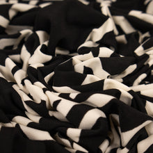 Load image into Gallery viewer, Printed Stretch Knit Deadstock - Abstract Black &amp; White
